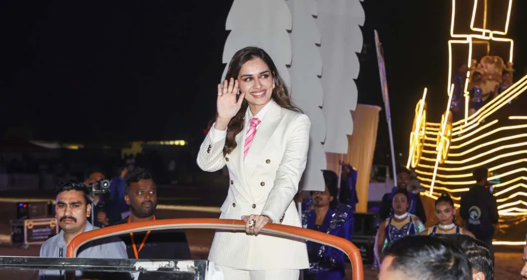 Manushi Chhillar waves to the crowd at the opening ceremony